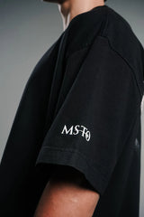 Camiseta Oversize Manifesto Romanticismo Negra